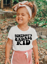 Load image into Gallery viewer, Somebody&#39;s Badass Kid Graphic Tee